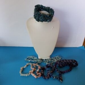 Eight piece lot gemstone stretch bracelet.